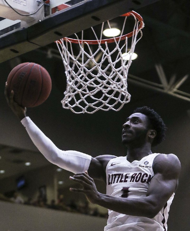 UALR’s Andre Jones goes for a shot against Texas Arlington on Thursday at Jack Stephens Center in Little Rock. Jones finished with a team-high 24 points.