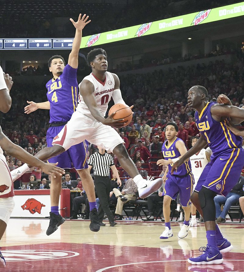 Special to The Sentinel-Record/Craven Whitlow STEPPING UP: Razorback senior guard Jaylen Barford (0) from Jackson, Tenn., goes up for two on his way to a game-leading 17 points in the Hogs 75-54 loss to LSU at Bud Walton Arena in Fayetteville Wednesday. Arkansas drops to 11-5 for the season and 1-3 in conference play before hosting Missouri Saturday.