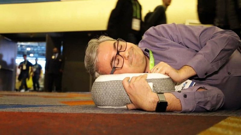 Geoffrey A. Fowler is seen with the Somnox, a robot that serves as a sleep companion.