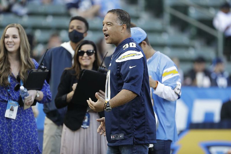 Los Angeles Dodgers Manager Dave Roberts, shown here at a Dec. 31 NFL game, will entertain Houston Astros Manager A.J. Hinch next week at his home in California. 