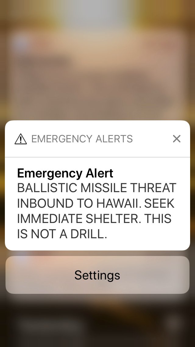 This smartphone screen capture shows a false incoming ballistic missile emergency alert sent from the Hawaii Emergency Management Agency system on Saturday, Jan. 13, 2018. 