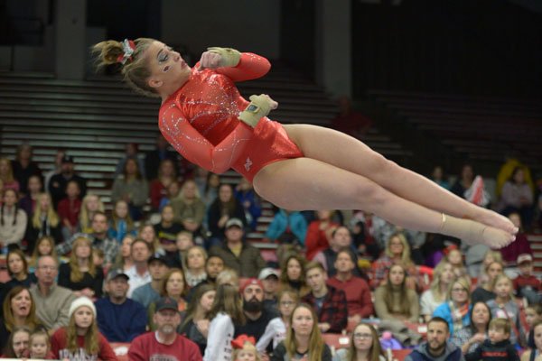 Arkansas' Sydney McGlone competes Friday, Jan. 12, 2018, in the vault portion of the 11th-ranked Razorbacks' meet with sixth-ranked Kentucky in Barnhill Arena in Fayetteville. 