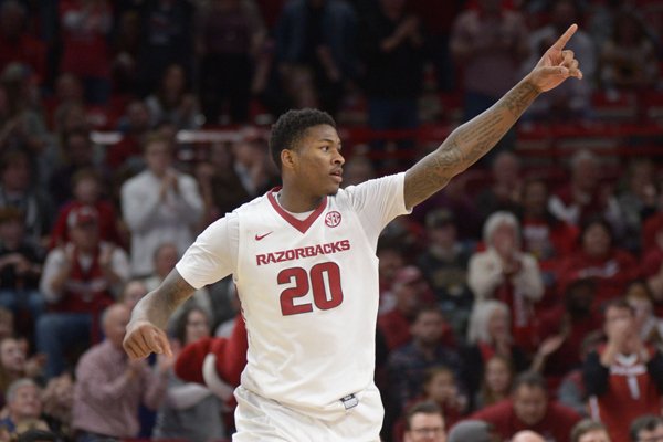 Arkansas forward Darious Hall points to the crowd during a game against Missouri on Saturday, Jan. 13, 2018, in Fayetteville. 