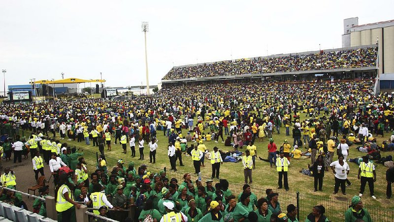 Ruling African National Congress party supporters attend the party’s 106th anniversary celebrations Saturday in East London, South Africa.