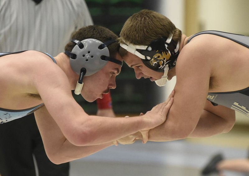 NWA Democrat-Gazette/MICHAEL WOODS @NWAMICHAELW Springdale Har-Ber's Ben Fears (at left) has found success in high school wrestling despite the challenges of being diagnosed with autism. The senior will be a Class 6A-7A state title contender in the 182-pound weight class.