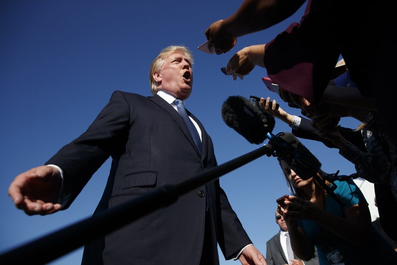 The Associated Press TRUMP'S TRIUMPHS: In this Sept. 24, 2017, photo, President Donald Trump speaks with reporters before boarding Air Force One at Morristown Municipal airport, in Morristown, N.J. Trump often brags that he's done more in his first year in office than any other president. That's a spectacular stretch. But while he's fallen short on many measures and has a strikingly thin legislative record, Trump has followed through on dozens of his campaign promises, overhauling the country's tax code, changing the country's posture abroad and upending the lives of hundreds of thousands of immigrants.