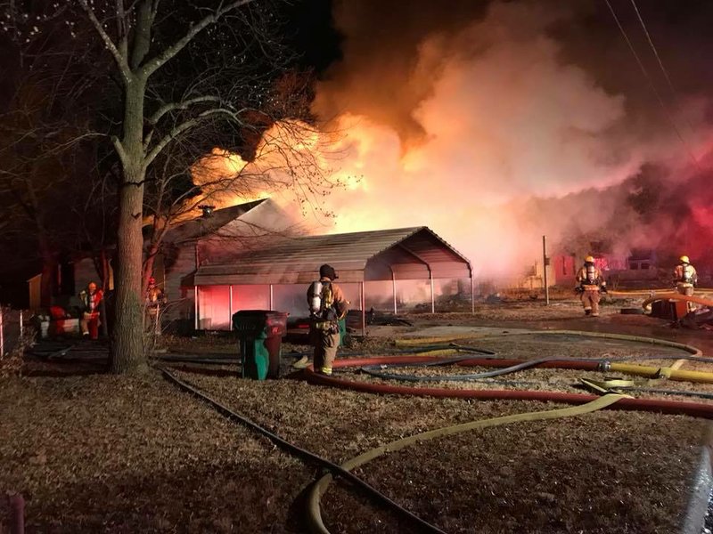 Courtesy Springdale Fire Department. Crews battle a fire at 1:30 a.m. Sunday, January 14 at the intersection of Ewalt Avenue and Hill Street. The home was unoccupied. There were no reported injuries.