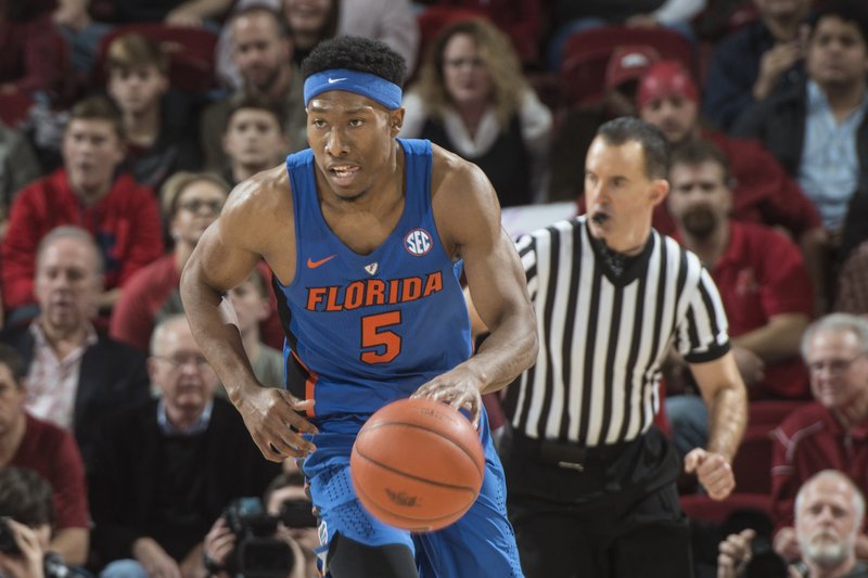 KeVaughn Allen (5) of the Florida Gators drives up the court against Arkansas Thursday Dec. 29, 2016 at Bud Walton Arena in Fayetteville.
