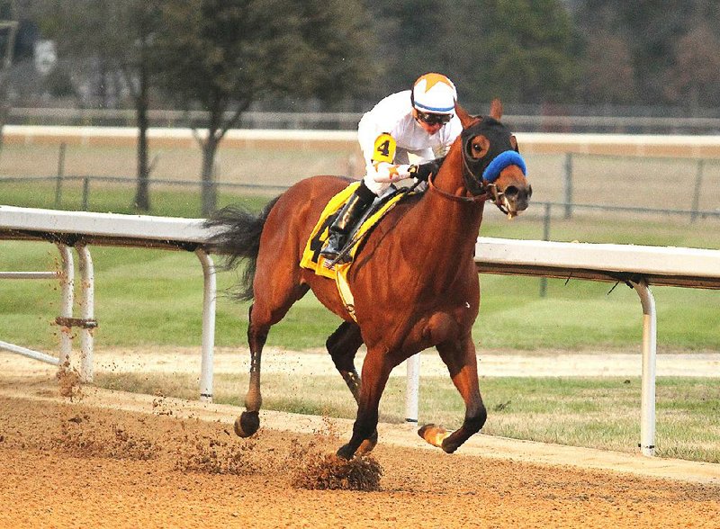 Jockey Drayden Van Dyke guides Mourinho across the wire to win the Smarty Jones Stakes on Monday at Oaklawn Park in Hot Springs.