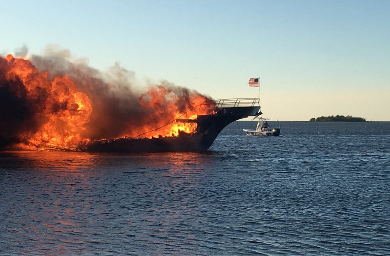 The Associated Press CASINO BOAT: In this photo provided by Pasco County, flames engulf a boat Sunday in the Tampa Bay area.