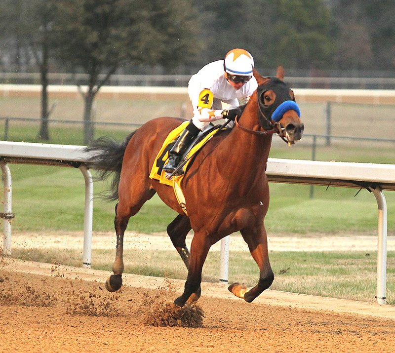 The Sentinel-Record/Richard Rasmussen MOURINHO WINS: Jockey Drayden Van Dyke guides Mourinho across the wire to win the Smarty Jones Stakes Monday at Oaklawn Park Monday. Lake Hamilton High graduate Drayden Van Dyke guided Mourinho to the stakes win by 3 1/4 lengths.