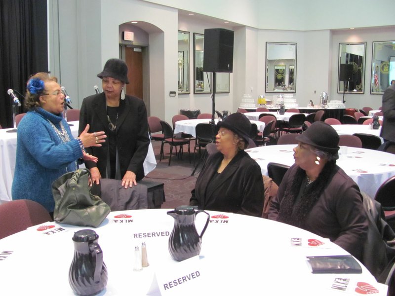 Former Northside High School teacher Rhonda Vanlue Gray (left) welcomes the three civil rights icons known as the McDonogh 3, (from second left)Tessie Prevost Williams, Gail Etienne Stripling and Leona Tate, at a Martin Luther King Jr. commemorative celebration Monday at the University of Arkansas at Fort Smith. Also attending the celebration was Louie McKinney, the first career deputy U.S. Marshal to lead the U.S. Marshals Service. Gray was on a panel discussing the integration of Fort Smith Northside High School in the 1960s.