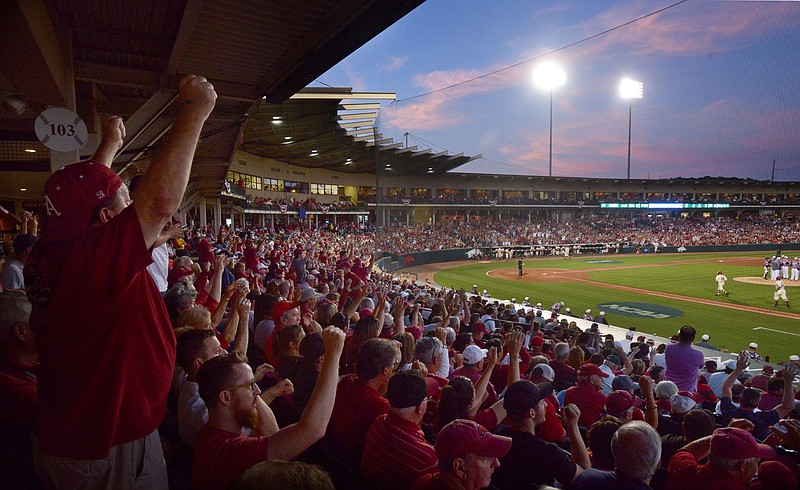 Arkansas fans cheer as Arkansas takes on Missouri State on Monday, June 5, 2017, during the final game of the NCAA Fayetteville Regional at Baum Stadium in Fayetteville.