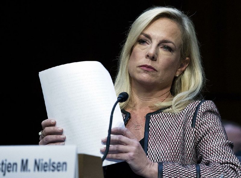 Homeland Security Secretary Kirstjen Nielsen told lawmakers under oath Tuesday that she “did not hear” President Donald Trump disparage African countries with a vulgar term at an Oval Office meeting, but said Trump and others used tough language. 

