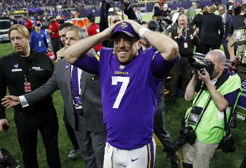 Minnesota Vikings quarterback Case Keenum celebrates after the Vikings’ 29-24 victory over the New Orleans Saints on Sunday in Minneapolis. With 99-year-old Millie Wall in attendance at U.S. Bank Stadium, Keenum threw a 61-yard touchdown pass to Stefon Diggs to give the Vikings the victory. 