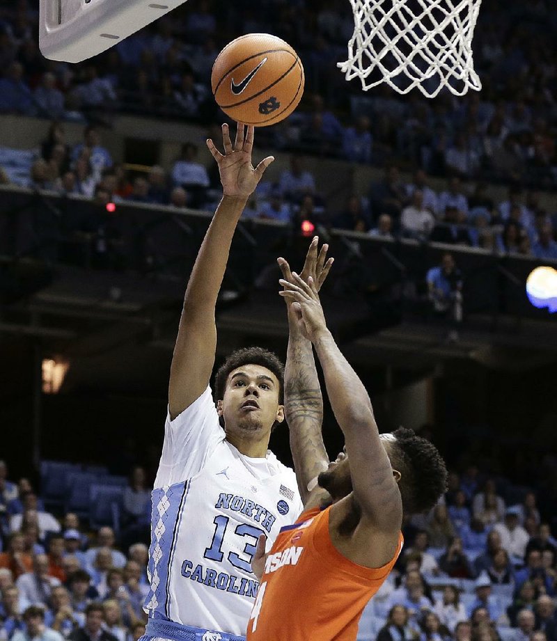 North Carolina guard Cameron Johnson (left) had a season-high 21 points in No. 15 North Carolina’s 87-79 victory over No. 20 Clemson on Tuesday night in Chapel Hill, N.C. 