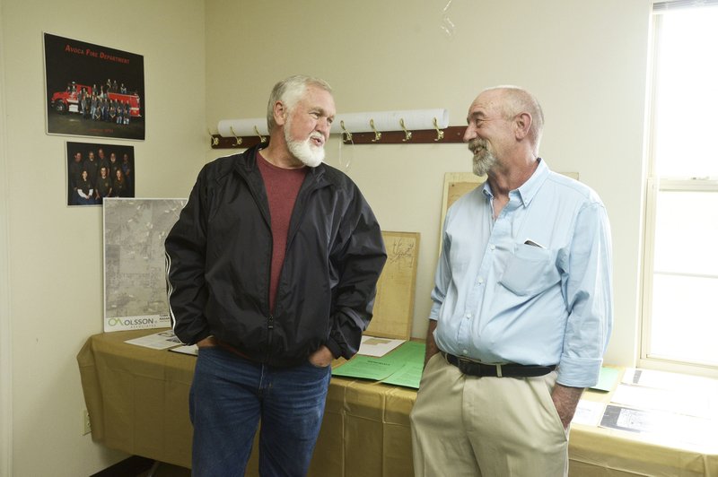 File Photo/NWA Democrat-Gazette/BEN GOFF  @NWABENGOFF Myles McDaniel (left), who lives just outside Avoca, chats April 2 with Avoca Mayor Jordan Sullivan during a celebration of the 50th anniversary of the town's founding at Avoca Town Hall.