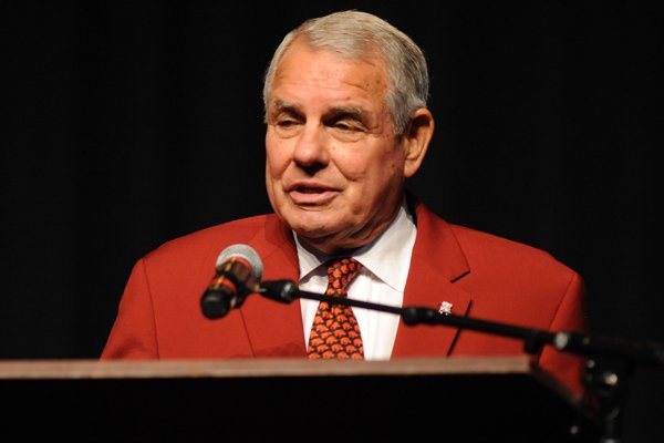 Ken Hatfield, former player and Arkansas football caoch, speaks Saturday, Aug. 19, 2017, during a celebration in Bud Walton Arena on the University of Arkansas campus in Fayetteville for the life of Frank Broyles, the former coach and athletics director.