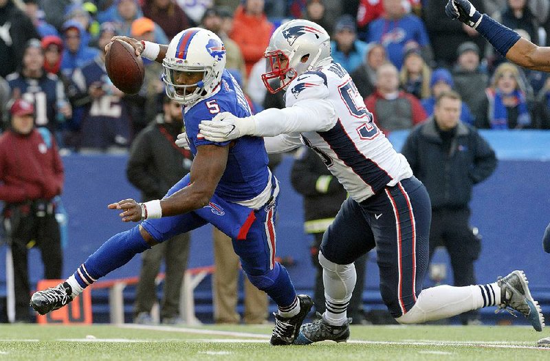 New England Patriots linebacker Kyle Van Noy (right), shown sacking Buffalo Bills quarterback Tyrod Taylor on Dec. 3, has become one of the leaders on the Patriots’ defense entering Sunday’s AFC Championship Game against the Jacksonville Jaguars. 