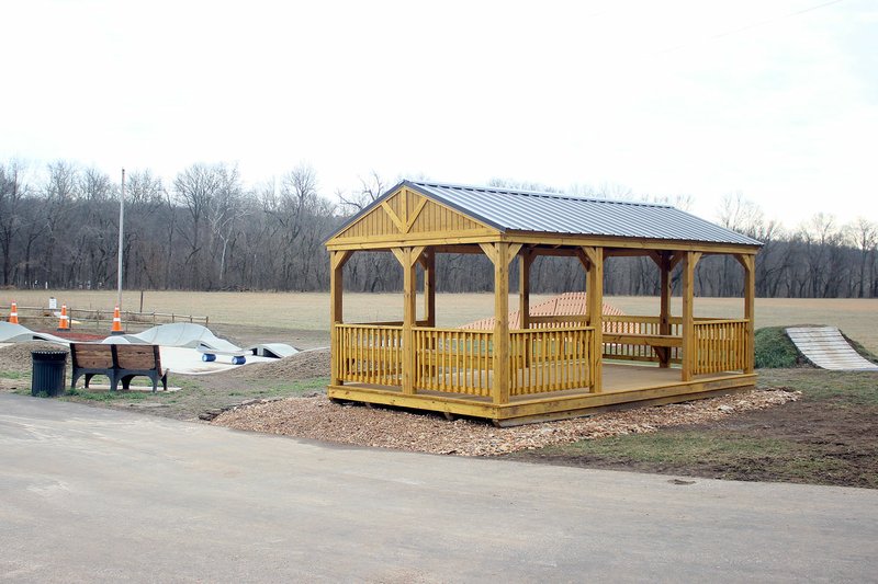 MEGAN DAVIS MCDONALD COUNTY PRESS/Pineville's Bike and Skate Park was recently outfitted with an enclosed pavilion featuring bench seats on both sides. Cyclists and skaters now have a shady place to catch a breath during their outdoor activities.