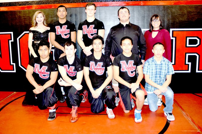 RICK PECK/SPECIAL TO MCDONALD COUNTY PRESS McDonald County High School recently recognized senior members of its 2017-2018 wrestling team. The team includes Kevin Sackryas (front, left), Jakob Gerow, Jaw Di, Adrian Ocampo, Erin Yang, manager Hailey Knadle (back, left), Wilson Menas, Timber Teague, Tinker Kinser and manager Courtnie Eberley.