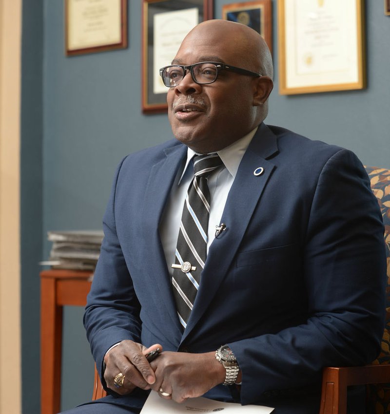 Bryan Matthews, director of the Veterans Health Care System of the Ozarks, speaks Wednesday in his office in Fayetteville. Matthews is leaving after about two years in Fayetteville and has accepted a similar position in Biloxi, Miss.