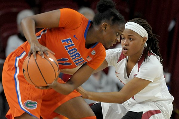 Arkansas' Raven Northcross-Baker defends Florida's Dyandria Anderson during a game Thursday, Jan. 18, 2018, in Fayetteville. 