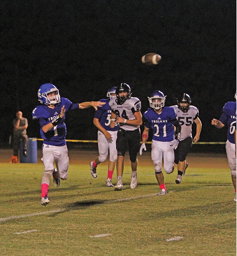 Terrance Armstard/News-Times Parkers Chapel quarterback Caleb Jacobs throws a pass during the Trojans' contest against Bearden last season. A sophomore, Jacobs accounted for over 1,800 yards of total offense with 22 offensive touchdowns. For his efforts, Jacobs is the News-Times Rookie of the Year.