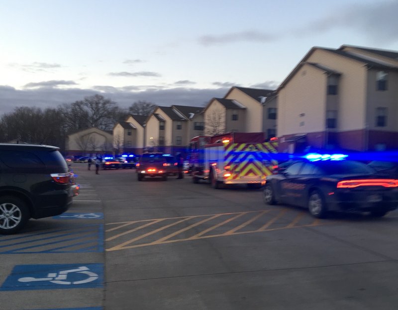 The Pulaski County sheriff's office responds Friday, Jan. 19, 2018, to a shooting at Fairfax Crossing Apartments, 5900 McCain Park Place. 