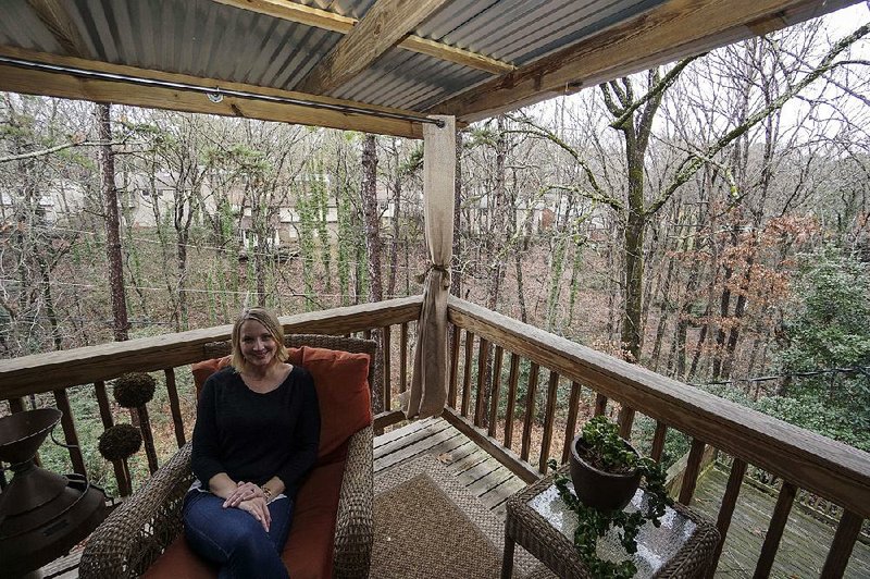 Becky Pittman and her favorite spot, her little back deck at her home in Little Rock Thursday, January 11, 2018.