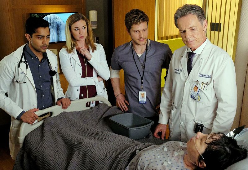 Fox’s new medical drama, The Resident, stars (from left) Manish Dayal, Emily VanCamp, Matt Czuchry and Bruce Greenwood. The series debuts at 9 p.m. today following the NFC Championship game.