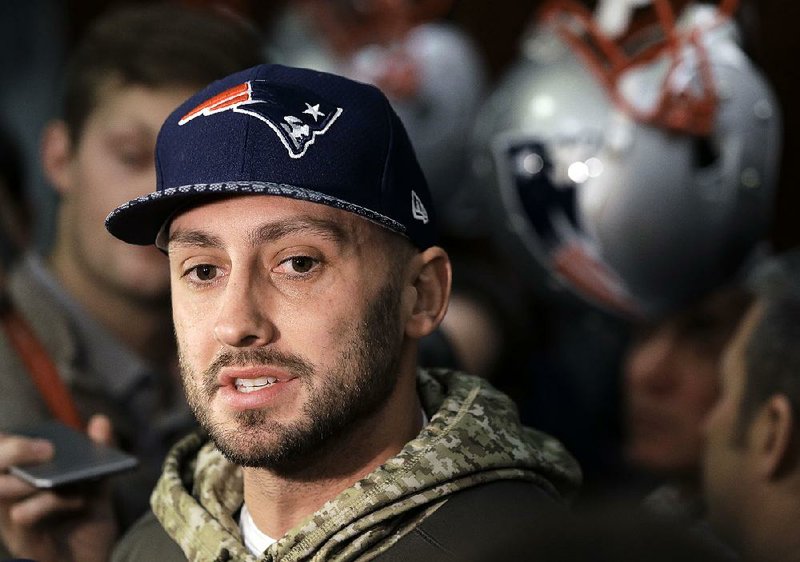 New England Patriots quarterback Brian Hoyer faces reporters in the team's locker room following an NFL football practice, Thursday, Jan. 18, 2018, in Foxborough, Mass.
