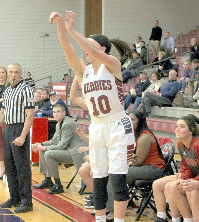 The Sentinel-Record/James Leigh FROM THE CORNER: Henderson State senior guard Haleigh Henson puts up a shot for three against Harding as the Reddies routed the Bisons, 79-64, Thursday night at Duke Wells Center in Arkadelphia. Henson was 2-for-7 from distance and had 12 points on the night.