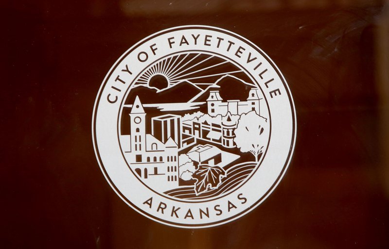 The city of Fayetteville logo is seen at City Hall on Feb. 14.