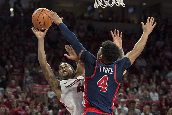 Arkansas guard Daryl Macon shoots over Ole Miss guard Breein Tyree during a game Saturday, Jan. 20, 2018, in Fayetteville. 