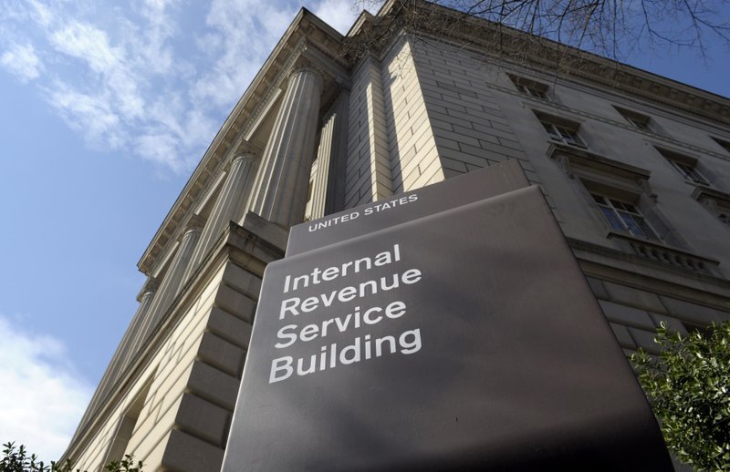 In this photo March 22, 2013, file photo, the exterior of the Internal Revenue Service (IRS) building in Washington. There’s plenty that won’t get done if thousands of federal employees are barred from working until dysfunctional Washington agrees on a plan to restore funding. 