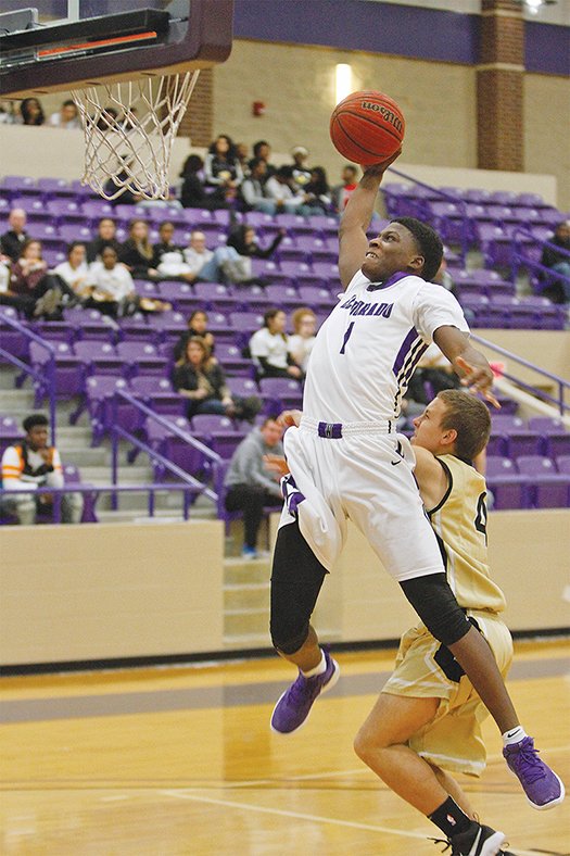 Terrance Armstard/News-Times El Dorado's Joderrio Ramey goes up for a dunk during the Wildcats' contest against DeQueen on Friday night at Wildcat Arena.