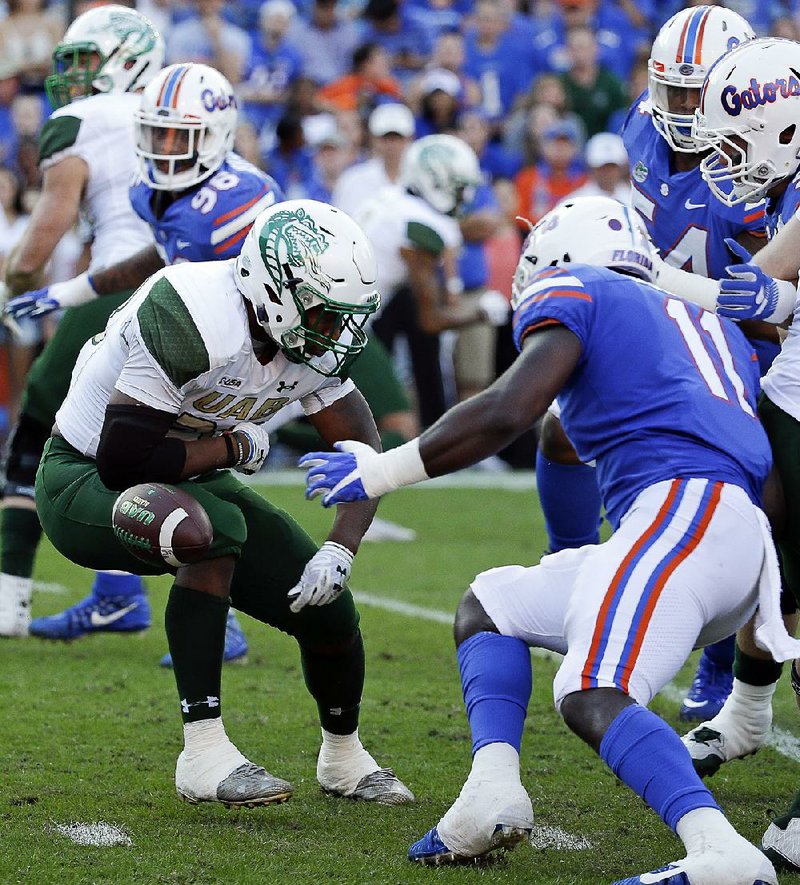 Alabama-Birmingham reinstated football for the 2017 season and fi nished 8-5 with a loss to Ohio in the Bahamas Bowl. UAB had disbanded its football, rifle and bowling programs in December 2014, after the university found the athletic budget had been $1 million over in each of the previous 10 years.