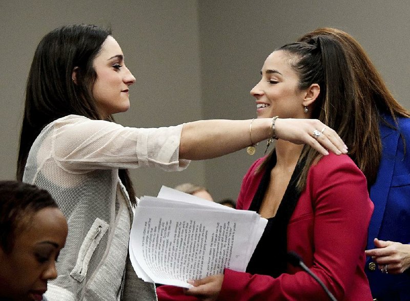 Aly Raisman (right) wants former USA Gymnastics team doctor Larry Nassar to suffer after more than 80 women and girls accused him of sexual abuse.