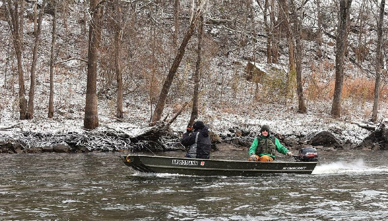 Ed Kubler (front) and Bill Eldridge motor through the snow to Buffalo Shoal during a phenomenal day of fishing on the White River.