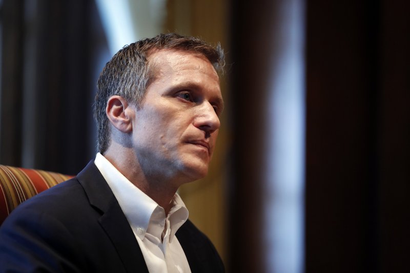 Missouri Gov. Eric Greitens listens to a question during an interview in his office at the Missouri Capitol Saturday, Jan. 20, 2018, in Jefferson City, Mo. Greitens discussed having an extramarital affair in 2015 before taking office. (AP Photo/Jeff Roberson)