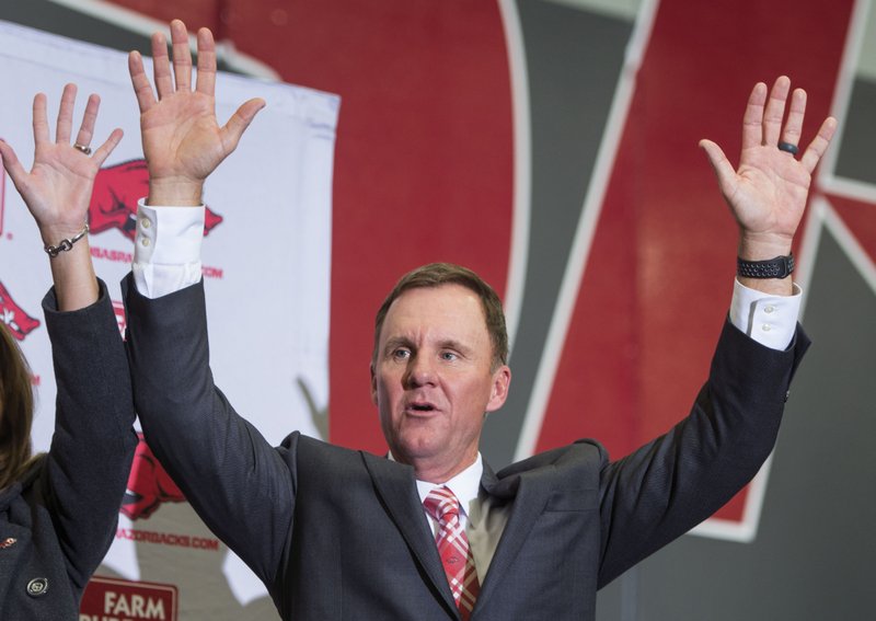 Chad Morris calls the hogs Thursday, Dec. 7, 2017, during a press conference at the Fowler Family Baseball & Track Indoor Training Center in Fayetteville.