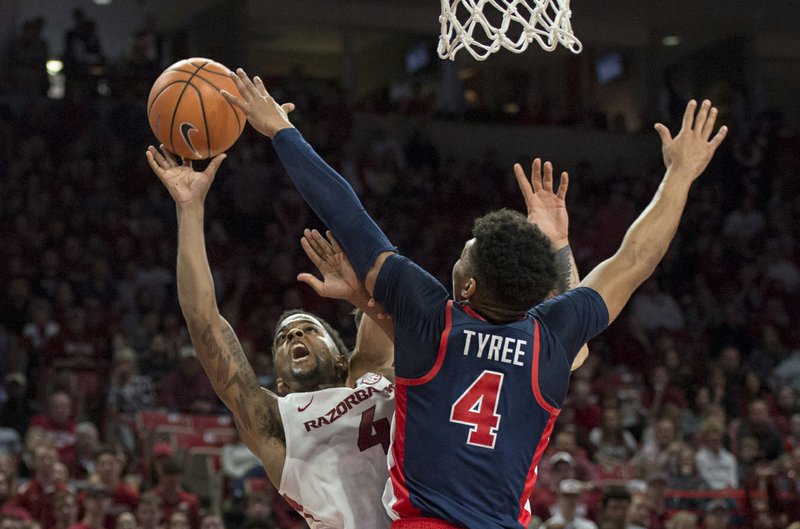 Arkansas Razorbacks guard Daryl Macon (4) shoots a layup during a basketball game, Saturday, January 20, 2018 at Bud Walton Arena in Fayetteville.