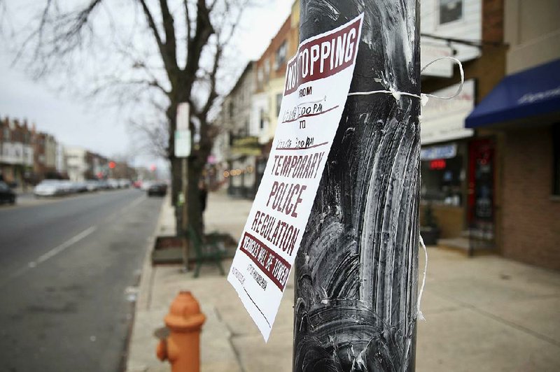 A greased light pole stands near the intersection of Broad and Shunk streets in south Philadelphia before Sunday’s NFC Championship Game between the Eagles and Vikings. Crisco was used  to prevent exuberant fans from climbing poles after the Eagles’ victory, which sent them to the Super Bowl on Feb. 4 against New England.