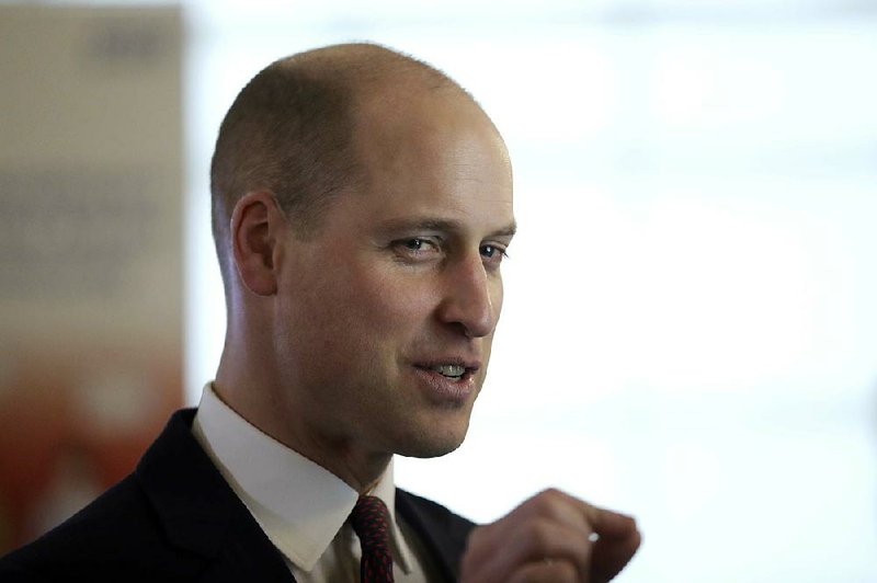 Britain's Prince William chats to guests at a reception after delivering a speech to celebrate the national rollout of the 'Step into Health' programme, at Chandos House in London, Thursday, Jan. 18, 2018. The initiative is supported by the Royal Foundation to help ex-service people, their spouses and dependants find employment in the National Health Service. The event was hosted by NHS Employers. 