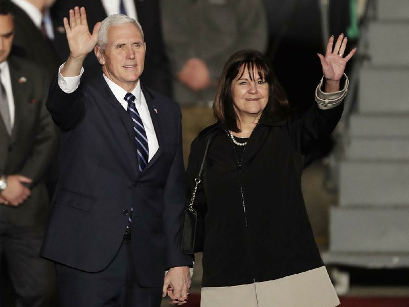 U.S. Vice President Mike Pence and his wife, Karen, acknowledge greetings after arriving at the airport in Tel Aviv, Israel, on Sunday.
