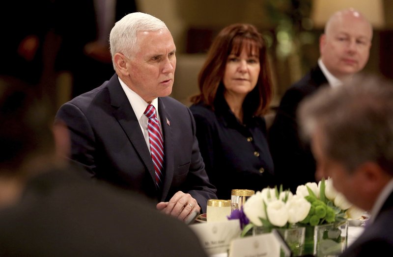 U.S. Vice President Mike Pence and his wife Karen Pence, attend a lunch hosted by Jordan's King Abdullah II at the Husseiniyeh Palace in Amman, Jordan, Sunday, Jan. 21, 2018. (AP Photo/Raad Adayleh)