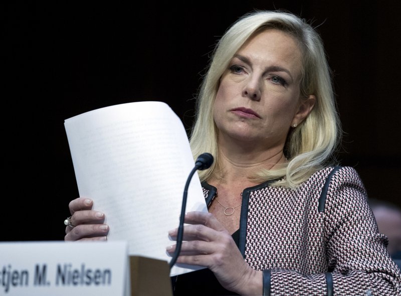 In this Tuesday, Jan. 16, 2018, file photo, Homeland Security Secretary Kirstjen Nielsen testifies before the Senate Judiciary Committee on Capitol Hill in Washington. Nielsen said that her agency views cybersecurity as its top election-related priority and is focused on working with state and local officials to secure their election systems from cyber threats and hackers. 