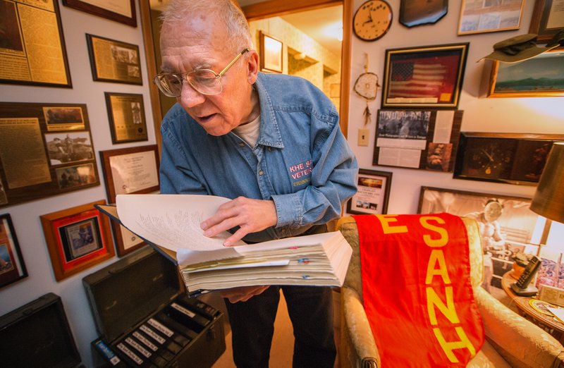 The Washington Post Phot via AP/Gary Porter Retired Naval Chaplain Ray Stubbe, of Wauwatosa, Wisconsin, reads from a transcript of diary from his days during the Siege of Khe Sanh in Viet Nam 50 years ago.