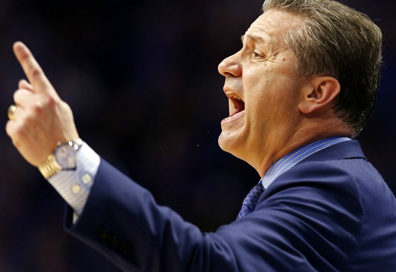 AP Photo/James Crisp Kentucky coach John Calipari gestures to his team during the second half of an NCAA college basketball game against Florida, Saturday, Jan. 20, 2018, in Lexington, Ky. Florida won 66-64.